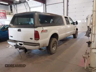 2003 Ford Super Duty F-250 XL with VIN 1FTNW21F43EA04885, listed as a IAAI auction lot 42073892 with 1 mi miles. Bid and sale history available at carsss.com. Image 4.