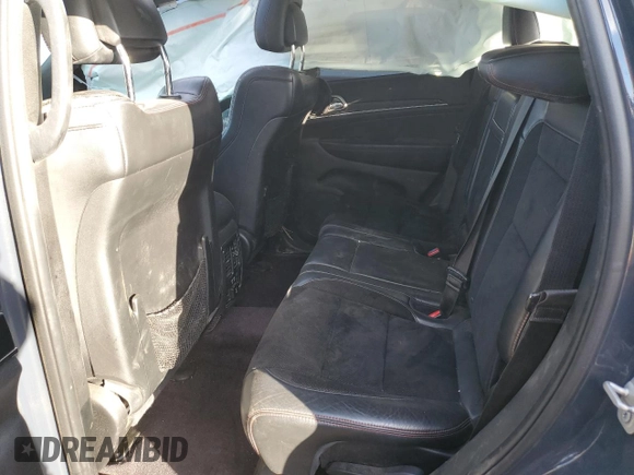 2017 Jeep Grand Cherokee Trailhawk with VIN 1C4RJFLT8HC772429, listed as a Copart auction lot 89334325 with 193,516 mi miles and Salvage title. Bid and sale history available at DreamBid. Image 11.