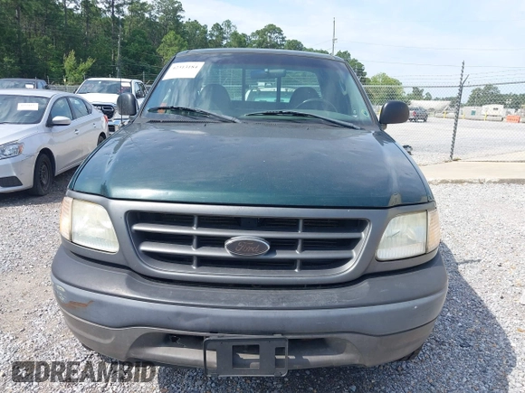 2003 Ford F-150 XL z VIN 1FTRX18L13NB27919, wystawiony jako IAAI lot #42313184 z przebiegiem 113 846 mil mil oraz . Historia ofert i sprzedaży dostępna na DreamBid. Obrazek 6.