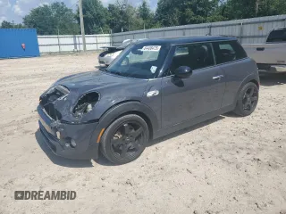 2016 MINI Hardtop S z VIN WMWXP7C58G2C60980, wystawiony jako Copart lot #64408475 z przebiegiem 156 520 mil mil oraz Szkoda całkowita • Salvage title. Historia ofert i sprzedaży dostępna na DreamBid. Obrazek 1.