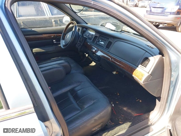 2008 Mercury Grand Marquis LS with VIN 2MEHM75V88X618599, listed as a IAAI auction lot 41698391 with 238,557 mi miles. Bid and sale history available at carsss.com. Image 5.
