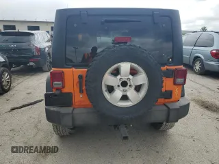 2013 Jeep Wrangler Unlimited Rubicon with VIN 1C4BJWFGXDL545866, listed as a Copart auction lot 59788115 with 102,617 mi miles and Salvage title. Bid and sale history available at DreamBid. Image 6.