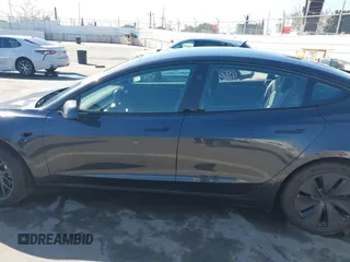 2024 Tesla Model 3 with VIN 5YJ3E1EA7RF717855, listed as a IAAI auction lot 41838814 with 8,750 mi miles and . Bid and sale history available at DreamBid. Image 14.