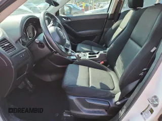 2016 Mazda CX-5 Sport with VIN JM3KE4BYXG0704194, listed as a Copart auction lot 62095735 with 93,970 mi miles and Salvage title. Bid and sale history available at DreamBid. Image 7.