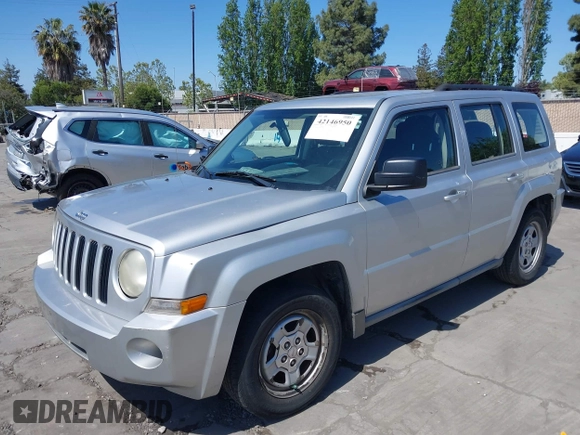 2010 Jeep Patriot Sport with VIN 1J4NT2GBXAD660180, listed as a IAAI auction lot 42146950 with 217,054 mi miles. Bid and sale history available at carsss.com. Image 2.