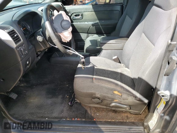 2009 GMC Canyon Work Truck with VIN 1GTDT19E698142512, listed as a Copart auction lot 77493574 with 0 mi miles and Salvage Title. Bid and sale history available at carsss.com. Image 7.