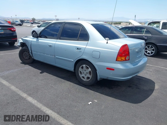 2005 Hyundai Accent GLS z VIN KMHCG45C85U591452, wystawiony jako IAAI lot #42114303 z przebiegiem 173 832 mil mil oraz . Historia ofert i sprzedaży dostępna na DreamBid. Obrazek 3.