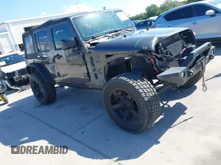 2014 Jeep Wrangler Unlimited Sport with VIN 1C4BJWDG4EL295044, listed as a IAAI auction lot 41997837 with 143,447 mi miles. Bid and sale history available at carsss.com. Image 1.