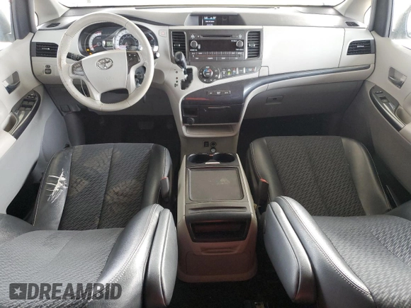 2012 Toyota Sienna SE with VIN 5TDXK3DC9CS215991, listed as a Copart auction lot 51868005 with 215,075 mi miles and Salvage title. Bid and sale history available at DreamBid. Image 8.