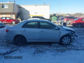2012 Toyota Corolla L with VIN JTDBU4EE7C9171949, listed as a IAAI auction lot 41401510 with 161,944 mi miles. Bid and sale history available at carsss.com. Image 14.