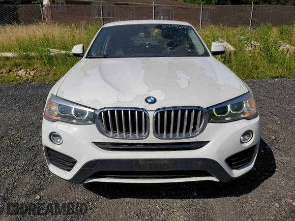 2015 BMW X4 xDrive28i with VIN 5UXXW3C51F0M89005, listed as a Copart auction lot 57392984 with 142,385 mi miles. Bid and sale history available at carsss.com. Image 5.