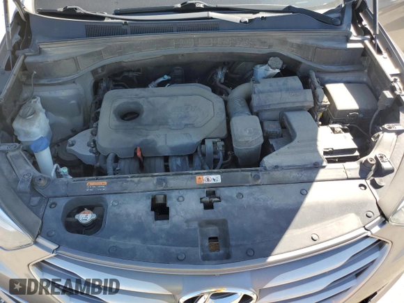 2017 Hyundai Santa Fe 2.4L z VIN 5NMZU3LB2HH025486, wystawiony jako Copart lot #58055185 z przebiegiem 120 364 mil mil oraz Szkoda całkowita • Salvage title. Historia ofert i sprzedaży dostępna na DreamBid. Obrazek 12.