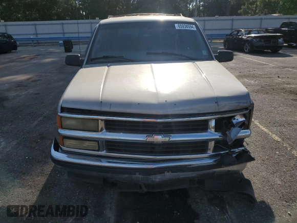 1999 Chevrolet Suburban with VIN 1GNEC16R9XJ490863, listed as a Copart auction lot 65938594 with 176,391 mi miles and Salvage Title. Bid and sale history available at carsss.com. Image 5.