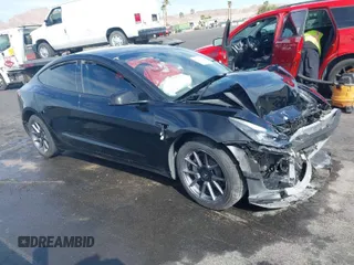 2021 Tesla Model 3 Standard Range Plus z VIN 5YJ3E1EA9MF876451, wystawiony jako IAAI lot #41703470 z przebiegiem Nie podano mil oraz . Historia ofert i sprzedaży dostępna na DreamBid. Obrazek 1.