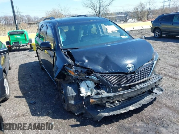 2015 Toyota Sienna SE with VIN 5TDXK3DC4FS581586, listed as a IAAI auction lot 41893274 with 263,577 mi miles. Bid and sale history available at carsss.com. Image 1.