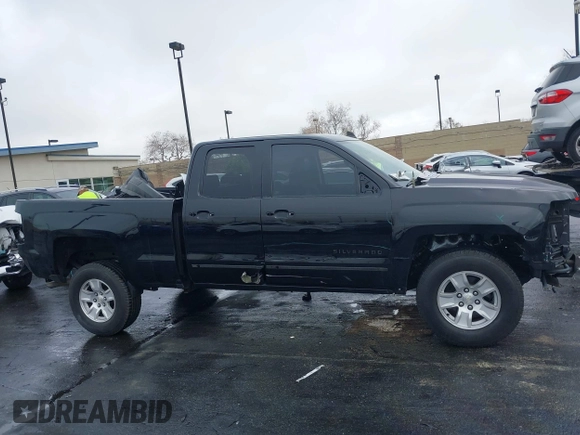 2017 Chevrolet Silverado 1500 LT with VIN 1GCRCREC5HZ113150, listed as a IAAI auction lot 41826582 with 50,565 mi miles and . Bid and sale history available at DreamBid. Image 14.