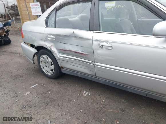 1997 Honda Civic EX with VIN 2HGEJ8643VH561244, listed as a IAAI auction lot 41810988 with 130,000 mi miles. Bid and sale history available at carsss.com. Image 6.