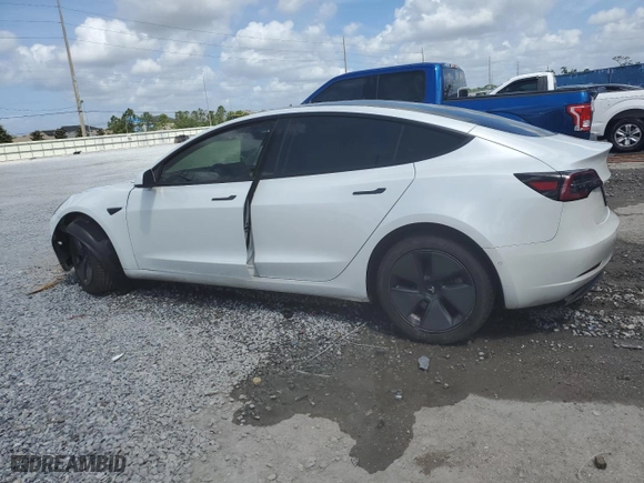 2021 Tesla Model 3 Standard Range Plus with VIN 5YJ3E1EA0MF920949, listed as a Copart auction lot 51477485 with 58,196 mi miles and Non Repairable. Bid and sale history available at carsss.com. Image 2.