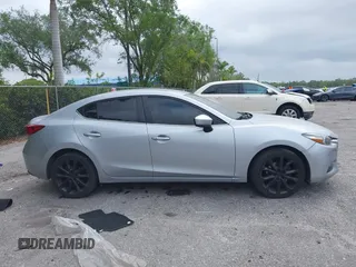 2017 Mazda 3 Touring with VIN 3MZBN1V76HM108148, listed as a IAAI auction lot 41911568 with 194,363 mi miles and . Bid and sale history available at DreamBid. Image 13.