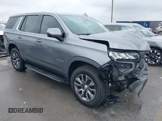 2022 Chevrolet Tahoe LT z VIN 1GNSCNKD8NR282251, wystawiony jako IAAI lot #42129473 z przebiegiem 48 477 mil mil oraz . Historia ofert i sprzedaży dostępna na DreamBid. Obrazek 1.
