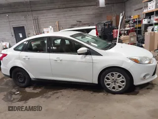 2012 Ford Focus SE с VIN 1FAHP3F21CL301085, выставлен на аукционе IAAI как лот 42321328 с пробегом 157 818 миль миль и . История ставок и продаж доступна на DreamBid. Изображение 13.