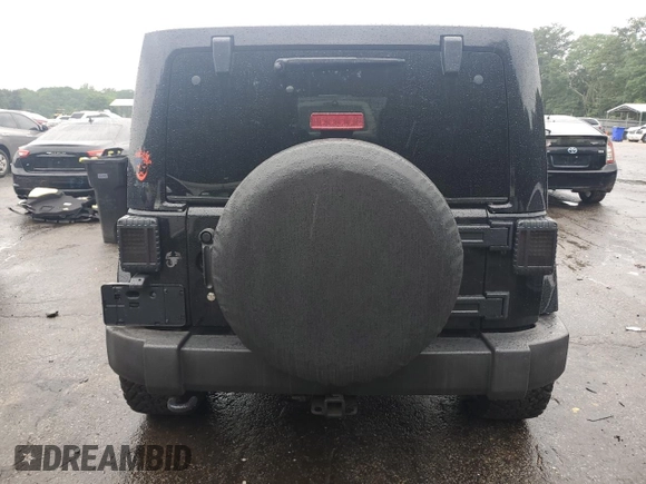 2015 Jeep Wrangler Unlimited Sahara with VIN 1C4BJWEG6FL643460, listed as a Copart auction lot 58557765 with 130,181 mi miles and Salvage title. Bid and sale history available at DreamBid. Image 6.