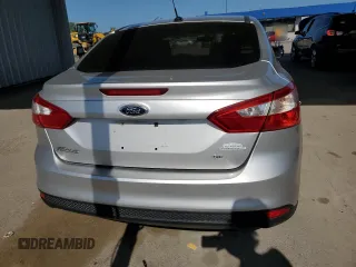 2012 Ford Focus SE with VIN 1FAHP3F29CL161559, listed as a Copart auction lot 61695575 with 127,412 mi miles and Salvage title. Bid and sale history available at DreamBid. Image 6.