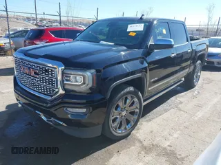 2017 GMC Sierra 1500 Denali with VIN 3GTU2PEJ9HG155420, listed as a IAAI auction lot 41572123 with Not Provided miles and . Bid and sale history available at DreamBid. Image 2.