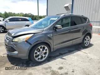 2015 Ford Escape Titanium z VIN 1FMCU0J98FUB06577, wystawiony jako Copart lot #61341175 z przebiegiem 66 206 mil mil oraz Szkoda całkowita • Salvage title. Historia ofert i sprzedaży dostępna na DreamBid. Obrazek 1.