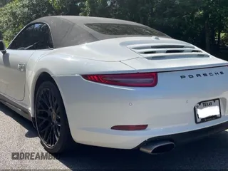 2014 Porsche 911 Carrera z VIN WP0CA2A92ES140453, wystawiony jako IAAI lot #42302853 z przebiegiem 47 879 mil mil oraz . Historia ofert i sprzedaży dostępna na DreamBid. Obrazek 3.