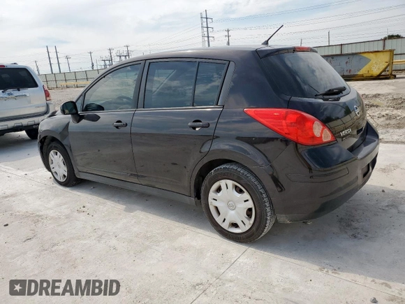 2010 Nissan Versa S with VIN 3N1BC1CP1AL460502, listed as a Copart auction lot 61106935 with 217,945 mi miles and Salvage title. Bid and sale history available at DreamBid. Image 2.