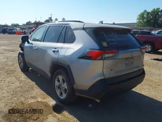 2019 Toyota RAV4 XLE with VIN JTMW1RFV7KD041106, listed as a IAAI auction lot 41759077 with 187,723 mi miles and . Bid and sale history available at DreamBid. Image 3.