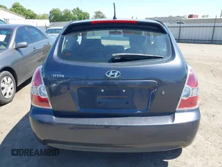 2007 Hyundai Accent SE with VIN KMHCN36C37U031369, listed as a IAAI auction lot 42093760 with 95,919 mi miles. Bid and sale history available at carsss.com. Image 16.
