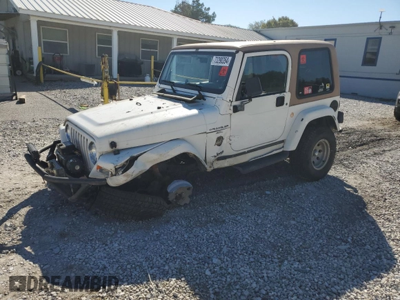 2000 Jeep Wrangler Sahara with VIN 1J4FA59SXYP764539, listed as a Copart auction lot 52707385 with 136,159 mi miles and Salvage title. Bid and sale history available at DreamBid. Image 1.