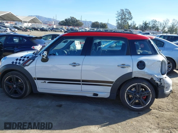 2014 MINI Countryman John Cooper Works with VIN WMWXD1C55EWS34510, listed as a IAAI auction lot 41409043 with 93,313 mi miles and . Bid and sale history available at DreamBid. Image 14.