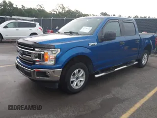 2018 Ford F-150 XL with VIN 1FTEW1CB2JFC79764, listed as a IAAI auction lot 42378319 with 69,571 mi miles and . Bid and sale history available at DreamBid. Image 2.