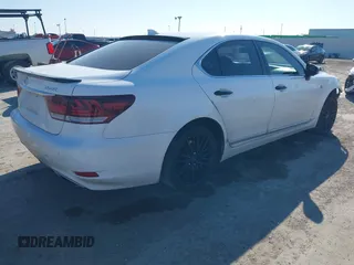 2015 Lexus LS with VIN JTHBL5EF5F5135527, listed as a IAAI auction lot 41361235 with 196,487 mi miles. Bid and sale history available at carsss.com. Image 4.