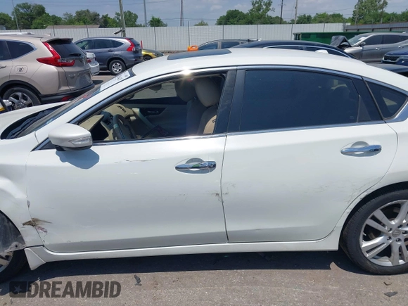 2013 Nissan Altima SV with VIN 1N4BL3AP7DN523429, listed as a IAAI auction lot 42016429 with 188,953 mi miles and . Bid and sale history available at DreamBid. Image 14.