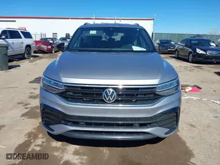 2022 Volkswagen Tiguan SE R-Line Black with VIN 3VVCB7AX4NM008121, listed as a IAAI auction lot 41671382 with 71,674 mi miles. Bid and sale history available at carsss.com. Image 12.