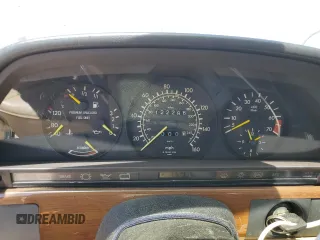 1990 Mercedes-Benz 300 with VIN WDBCA24D1LA529716, listed as a Copart auction lot 56581335 with 122,286 mi miles and Salvage Title. Bid and sale history available at DreamBid. Image 9.