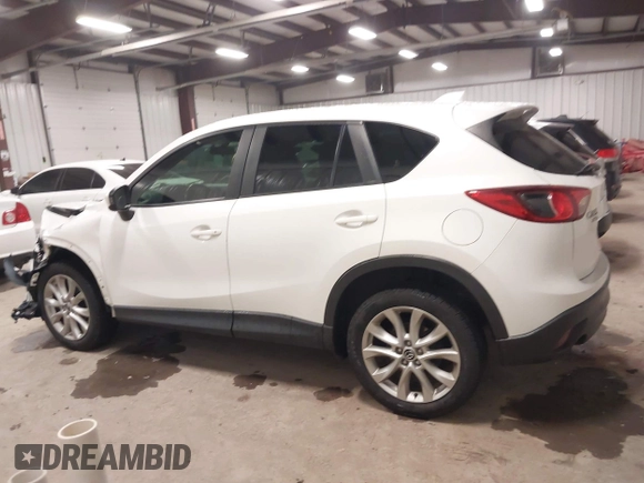 2014 Mazda CX-5 Grand Touring with VIN JM3KE4DY3E0374036, listed as a IAAI auction lot 41889030 with 162,611 mi miles and . Bid and sale history available at DreamBid. Image 14.