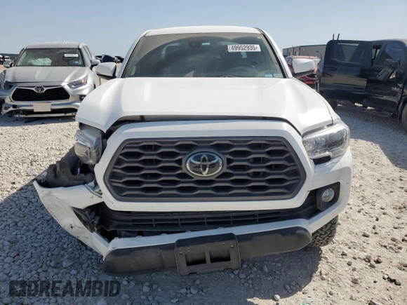 2021 Toyota Tacoma SR z VIN 3TMCZ5AN8MM387166, wystawiony jako Copart lot #49952935 z przebiegiem 63 175 mil mil oraz Szkoda całkowita • Salvage title. Historia ofert i sprzedaży dostępna na DreamBid. Obrazek 5.