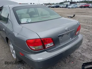2004 Infiniti I35 with VIN JNKDA31AX4T212950, listed as a IAAI auction lot 41390493 with 123,198 mi miles. Bid and sale history available at carsss.com. Image 6.