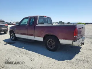 1999 Ford F-150 XL with VIN 1FTRX17L2XKB78998, listed as a Copart auction lot 65004535 with 155,271 mi miles and Salvage title. Bid and sale history available at DreamBid. Image 2.