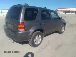 2006 Ford Escape Limited with VIN 1FMYU04126KC42744, listed as a IAAI auction lot 40839433 with 161,429 mi miles and . Bid and sale history available at DreamBid. Image 4.