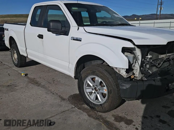 2015 Ford F-150 XLT with VIN 1FTFX1EFXFKD70393, listed as a Copart auction lot 51320365 with 173,741 mi miles and Salvage title. Bid and sale history available at DreamBid. Image 10.
