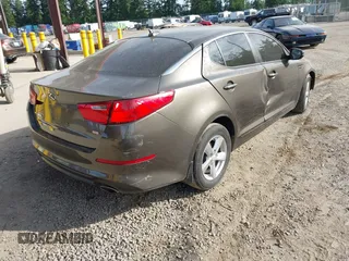 2015 Kia Optima LX with VIN 5XXGM4A77FG353705, listed as a IAAI auction lot 42519873 with 126,066 mi miles and . Bid and sale history available at DreamBid. Image 4.
