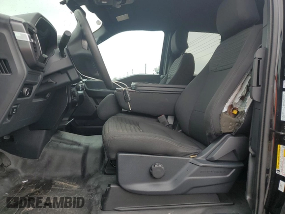 2023 Ford F-150 XL with VIN 1FTEX1CP4PKD57678, listed as a Copart auction lot 63735995 with 21,554 mi miles and Clean title. Bid and sale history available at DreamBid. Image 7.