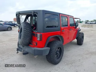 2015 Jeep Wrangler Unlimited Sport with VIN 1C4HJWDGXFL575918, listed as a IAAI auction lot 42349494 with Not provided miles and . Bid and sale history available at DreamBid. Image 4.
