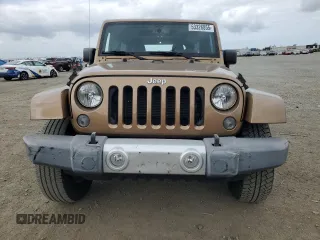 2015 Jeep Wrangler Unlimited Sahara z VIN 1C4BJWEG5FL645846, wystawiony jako Copart lot #53326855 z przebiegiem 122 510 mil mil oraz Szkoda całkowita • Salvage title. Historia ofert i sprzedaży dostępna na DreamBid. Obrazek 5.